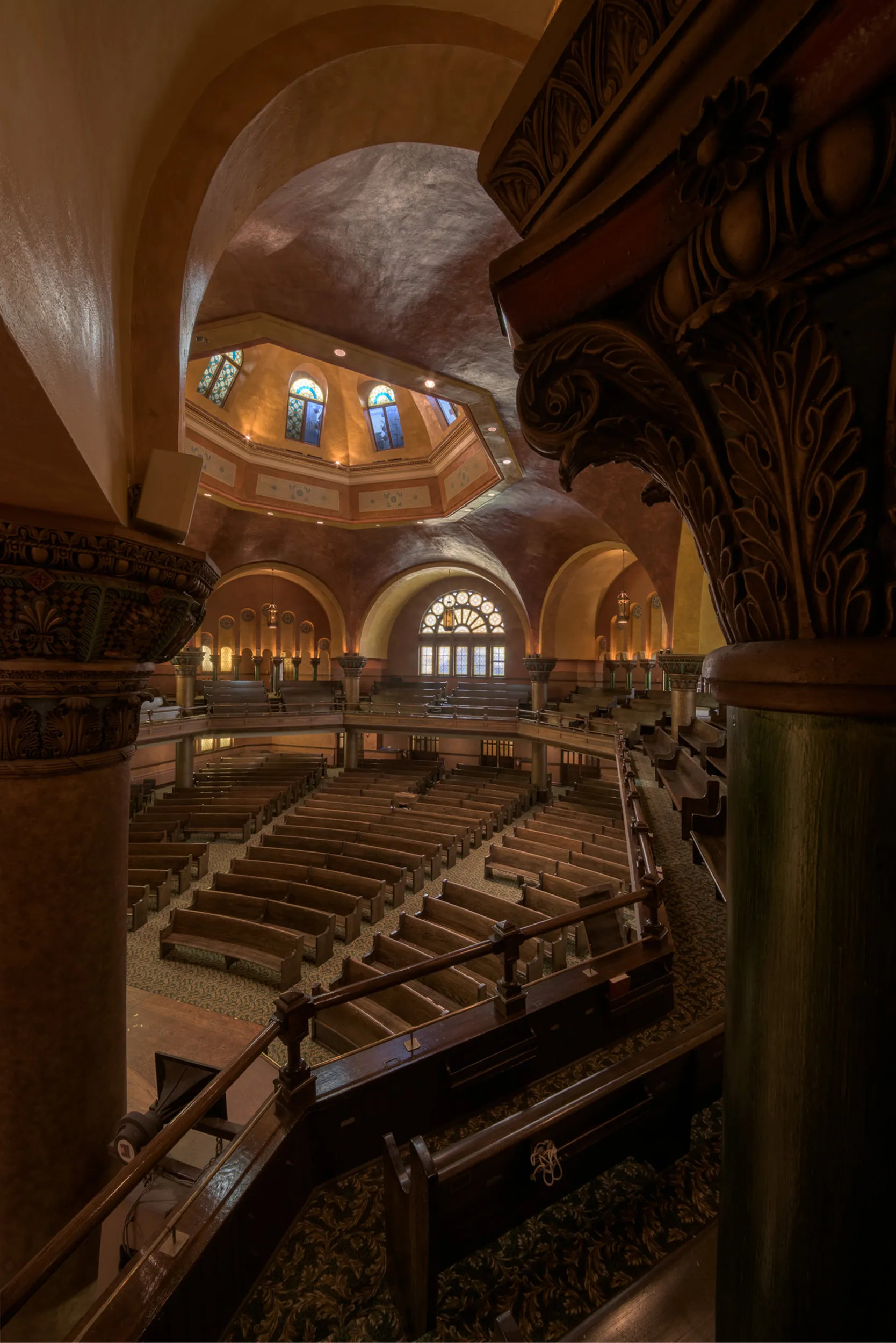 An image of the concert hall at Carleton Dominion-Chalmers Centre with a central large dome, stained glass windows and…